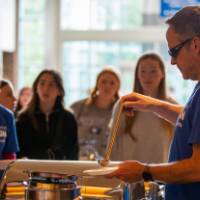 Families going through the buffet line at the Family Weekend Pancake Breakfast.